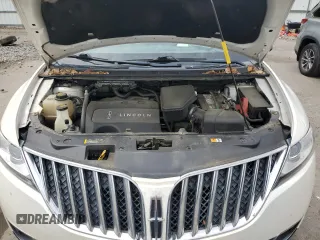 2013 Lincoln MKX with VIN 2LMDJ8JK0DBL06312, listed as a Copart auction lot 54804854 with 121,107 mi miles and Salvage Title. Bid and sale history available at carsss.com. Image 13.