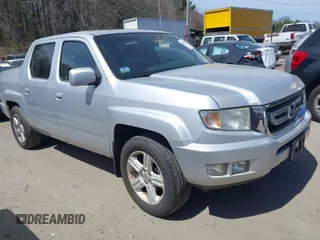 2009 Honda Ridgeline RTL with VIN 5FPYK16549B104258, listed as a IAAI auction lot 42073316 with 88,507 mi miles. Bid and sale history available at carsss.com. Image 1.