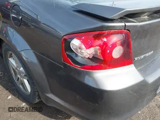 2014 Dodge Avenger SE with VIN 1C3CDZAG7EN218419, listed as a IAAI auction lot 41833778 with 133,192 mi miles. Bid and sale history available at carsss.com. Image 6.