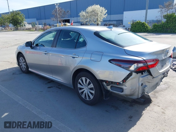 2021 Toyota Camry Hybrid LE with VIN 4T1C31AK5MU030969, listed as a IAAI auction lot 41862078 with 125,992 mi miles. Bid and sale history available at carsss.com. Image 3.