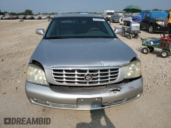 2004 Cadillac DeVille DTS z VIN 1G6KF57984U188454, wystawiony jako Copart lot #62397494 z przebiegiem 142 060 mil mil oraz Szkoda całkowita • Salvage title. Historia ofert i sprzedaży dostępna na DreamBid. Obrazek 5.
