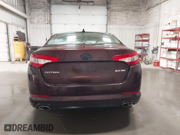 2011 Kia Optima EX with VIN KNAGN4A70B5108513, listed as a IAAI auction lot 42097595 with 184,334 mi miles and . Bid and sale history available at carsss.com. Image 17.