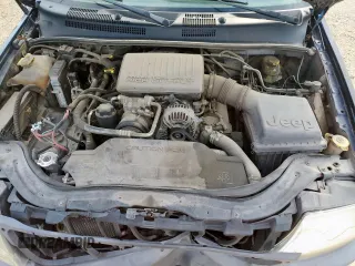 2004 Jeep Grand Cherokee with VIN 1J8GX58J54C121513, listed as a Copart auction lot 59384005 with 221,397 mi miles and Salvage title. Bid and sale history available at DreamBid. Image 12.