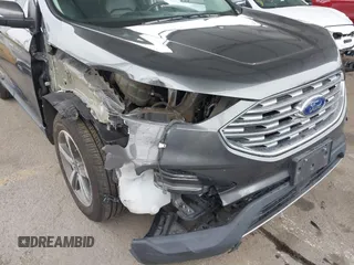 2020 Ford Edge SEL z VIN 2FMPK3J95LBA27779, wystawiony jako IAAI lot #42139536 z przebiegiem 58 285 mil mil oraz . Historia ofert i sprzedaży dostępna na DreamBid. Obrazek 6.