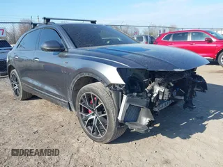 2021 Audi Q8 Premium Plus z VIN WA1EVAF14MD014781, wystawiony jako IAAI lot #42080085 z przebiegiem 53 171 mil mil oraz . Historia ofert i sprzedaży dostępna na DreamBid. Obrazek 1.
