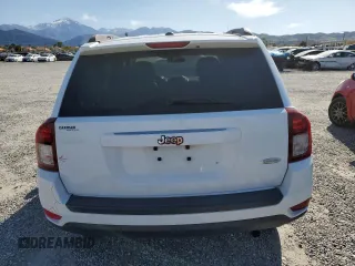 2016 Jeep Compass High Altitude Edition with VIN 1C4NJCEA7GD743862, listed as a Copart auction lot 49645465 with 103,253 mi miles and Salvage Title. Bid and sale history available at carsss.com. Image 6.