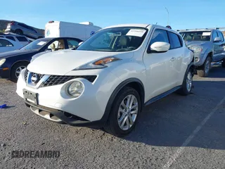 2016 Nissan Juke S with VIN JN8AF5MR7GT601556, listed as a IAAI auction lot 41210259 with 127,946 mi miles. Bid and sale history available at carsss.com. Image 2.