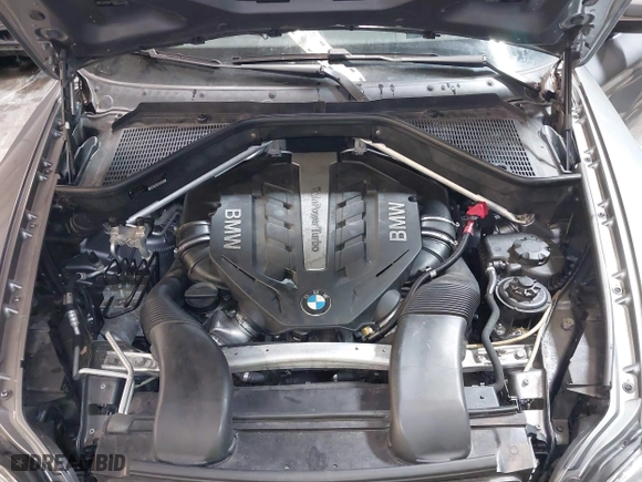 2014 BMW X6 50i with VIN 5UXFG8C55EL592995, listed as a IAAI auction lot 41724960 with 137,112 mi miles. Bid and sale history available at carsss.com. Image 10.