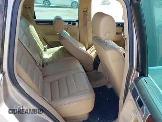 2004 Volkswagen Touareg with VIN WVGCM67L44D033856, listed as a IAAI auction lot 42142143 with 105,682 mi miles and . Bid and sale history available at DreamBid. Image 8.