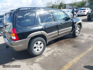 2004 Mazda Tribute LX with VIN 4F2CZ941X4KM29568, listed as a IAAI auction lot 41735353 with 285,989 mi miles. Bid and sale history available at carsss.com. Image 4.