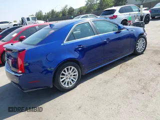 2012 Cadillac CTS Luxury with VIN 1G6DE5E59C0102621, listed as a IAAI auction lot 42554121 with 128,430 mi miles and . Bid and sale history available at DreamBid. Image 4.