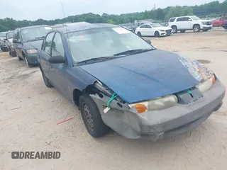 2000 Saturn SL z VIN 1G8ZF5280YZ108657, wystawiony jako IAAI lot #42414854 z przebiegiem Nie podano mil oraz . Historia ofert i sprzedaży dostępna na DreamBid. Obrazek 1.