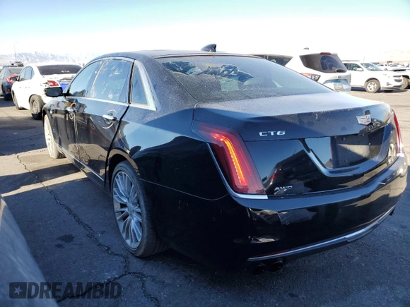 2017 Cadillac CT6 Premium Luxury AWD with VIN 1G6KH5R64HU182458, listed as a Copart auction lot 82795184 with 99,444 mi miles and Salvage title. Bid and sale history available at DreamBid. Image 2.