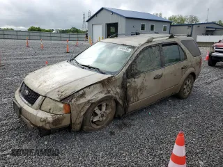 2005 Ford Freestyle SE with VIN 1FMZK04175GA38419, listed as a Copart auction lot 62158895 with 128,284 mi miles and Salvage title. Bid and sale history available at DreamBid. Image 1.