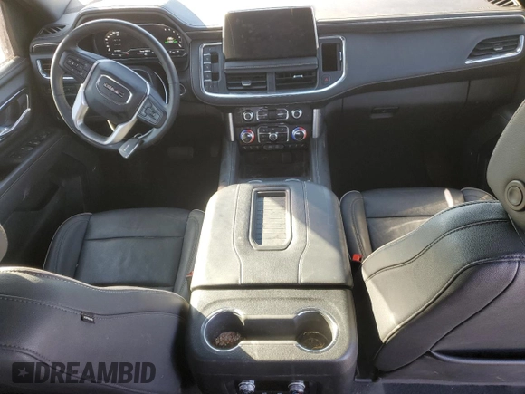 2023 GMC Yukon SLT with VIN 1GKS2BKD5PR209033, listed as a Copart auction lot 87643285 with 61,190 mi miles and Salvage Title. Bid and sale history available at carsss.com. Image 8.
