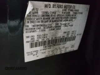 2008 Mercury Sable Premier z VIN 1MEHM42WX8G613597, wystawiony jako Copart lot #42096715 z przebiegiem 145 378 mil mil oraz Nie do naprawy. Historia ofert i sprzedaży dostępna na DreamBid. Obrazek 12.