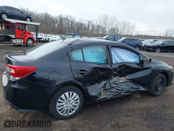 2020 Subaru Impreza with VIN 4S3GKAB69L3602396, listed as a IAAI auction lot 41621494 with 63,952 mi miles and . Bid and sale history available at DreamBid. Image 6.