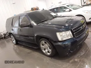 2007 Chevrolet Tahoe LS z VIN 1GNFC13C87R394003, wystawiony jako IAAI lot #42206597 z przebiegiem 147 358 mil mil oraz . Historia ofert i sprzedaży dostępna na DreamBid. Obrazek 1.
