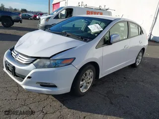 2010 Honda Insight EX with VIN JHMZE2H7XAS015986, listed as a IAAI auction lot 41229343 with 137,276 mi miles. Bid and sale history available at carsss.com. Image 17.