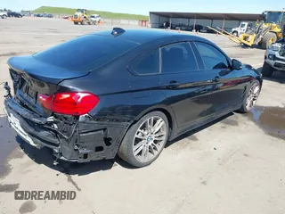 2015 BMW 4 Series 428i z VIN WBA4A9C52FGL86332, wystawiony jako IAAI lot #41970189 z przebiegiem 112 282 mil mil oraz . Historia ofert i sprzedaży dostępna na DreamBid. Obrazek 4.