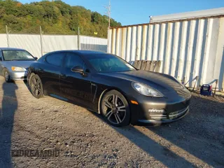 2013 Porsche Panamera with VIN WP0AA2A75DL014389, listed as a IAAI auction lot 40541878 with 67,119 mi miles and . Bid and sale history available at DreamBid. Image 1.