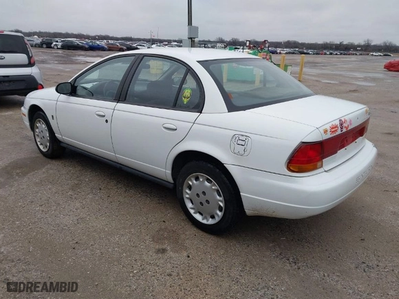1997 Saturn SL with VIN 1G8ZK5274VZ196952, listed as a IAAI auction lot 41514958 with 125,683 mi miles. Bid and sale history available at carsss.com. Image 3.