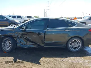 2016 Ford Fusion Titanium with VIN 3FA6P0K98GR158877, listed as a IAAI auction lot 41994013 with 57,027 mi miles and . Bid and sale history available at DreamBid. Image 15.