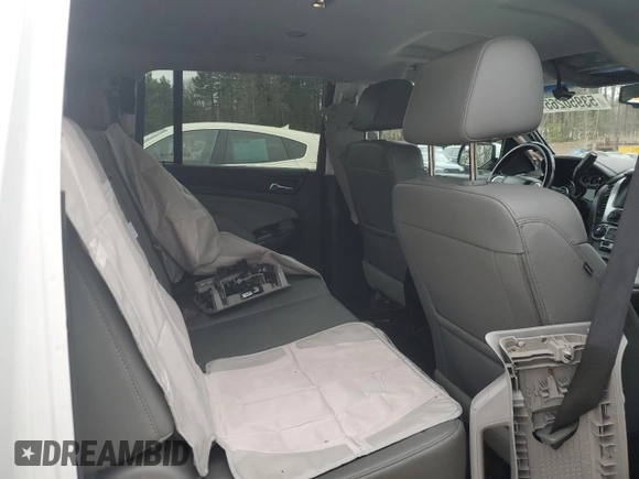 2019 Chevrolet Suburban LT with VIN 1GNSKHKC6KR205434, listed as a Copart auction lot 53950265 with 104,384 mi miles and Salvage Title. Bid and sale history available at DreamBid. Image 11.
