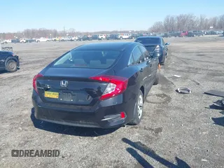2018 Honda Civic LX with VIN 19XFC2F58JE042456, listed as a IAAI auction lot 41823195 with 45,291 mi miles and . Bid and sale history available at DreamBid. Image 4.