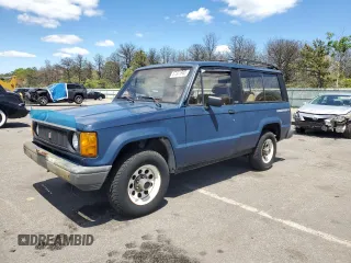 1986 Isuzu Trooper z VIN JAACH15LXG5419153, wystawiony jako Copart lot #57901965 z przebiegiem 135 211 mil mil oraz Czysty tytuł • Clean title. Historia ofert i sprzedaży dostępna na DreamBid. Obrazek 1.