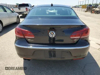 2016 Volkswagen CC Sport z VIN WVWBP7AN6GE513628, wystawiony jako Copart lot #57667775 z przebiegiem 122 302 mil mil oraz Szkody całkowita. Historia ofert i sprzedaży dostępna na DreamBid. Obrazek 6.