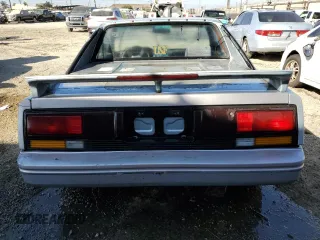 1989 Toyota MR2 z VIN JT2AW15C0K0146356, wystawiony jako Copart lot #76256644 z przebiegiem 294 380 mil mil oraz Tytuł czysty. Historia ofert i sprzedaży dostępna na DreamBid. Obrazek 6.