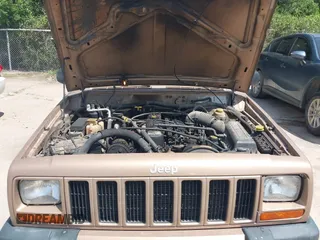 1999 Jeep Cherokee Sport with VIN 1J4FT68S1XL528885, listed as a IAAI auction lot 42536873 with Not provided miles and . Bid and sale history available at DreamBid. Image 10.