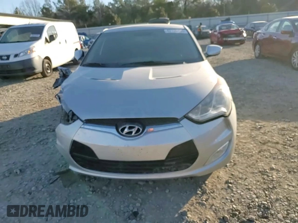 2012 Hyundai Veloster w/Gray Int с VIN KMHTC6AD2CU050738, выставлен на аукционе Copart как лот 42136435 с пробегом 151 482 миль миль и Списание • Salvage title. История ставок и продаж доступна на DreamBid. Изображение 11.
