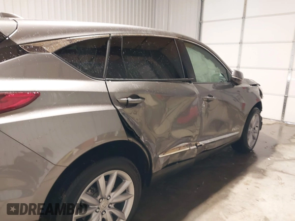 2023 Acura RDX with VIN 5J8TC2H33PL013401, listed as a IAAI auction lot 41619556 with 27,051 mi miles and . Bid and sale history available at DreamBid. Image 6.
