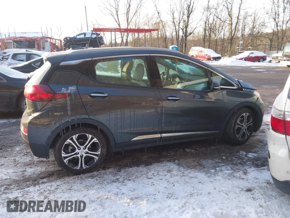 2021 Chevrolet Bolt EV Premier z VIN 1G1FZ6S09M4113694, wystawiony jako IAAI lot #41378289 z przebiegiem 40 979 mil mil oraz . Historia ofert i sprzedaży dostępna na DreamBid. Obrazek 14.