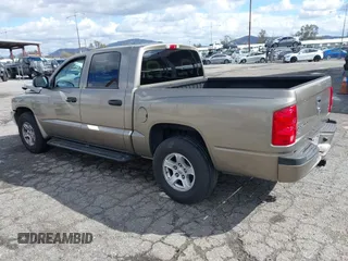 2007 Dodge Dakota SLT with VIN 1D7HE48N47S144084, listed as a IAAI auction lot 41798243 with 190,248 mi miles and . Bid and sale history available at carsss.com. Image 3.
