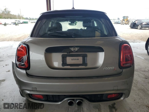 2021 MINI Hardtop 4 Door Cooper S with VIN WMWXU9C0XM2M90621, listed as a Copart auction lot 52513635 with 57,419 mi miles and Salvage title. Bid and sale history available at DreamBid. Image 6.