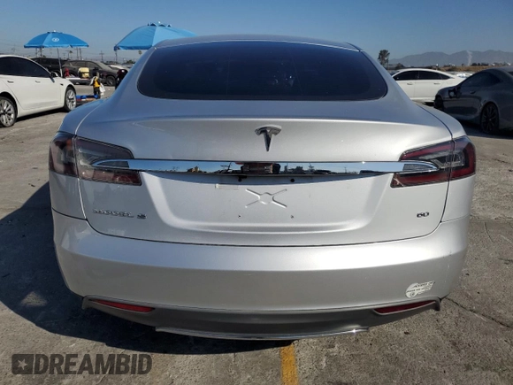 2013 Tesla Model S с VIN 5YJSA1DG7DFP11382, выставлен на аукционе Copart как лот 67097375 с пробегом 55 481 миль миль и Списание • Salvage title. История ставок и продаж доступна на DreamBid. Изображение 6.