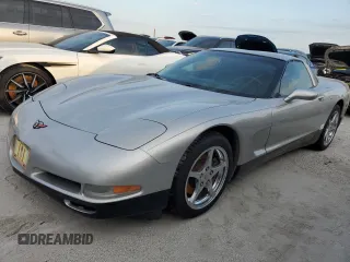 2004 Chevrolet Corvette with VIN 1G1YY22GX45132265, listed as a Copart auction lot 76516764 with 0 mi miles and Salvage Title. Bid and sale history available at carsss.com. Image 1.