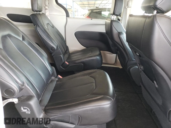 2023 Chrysler Pacifica Touring L with VIN 2C4RC1BG1PR581376, listed as a Copart auction lot 59901915 with 57,411 mi miles and Salvage title. Bid and sale history available at DreamBid. Image 11.