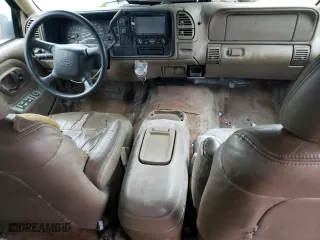 1999 Chevrolet Tahoe with VIN 1GNEC13R3XJ325377, listed as a Copart auction lot 83991974 with 257,816 mi miles and Salvage Title. Bid and sale history available at carsss.com. Image 8.