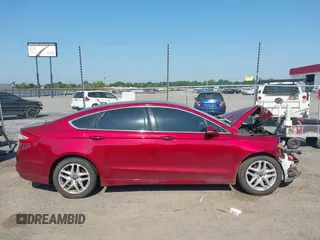 2016 Ford Fusion SE z VIN 3FA6P0H99GR287847, wystawiony jako IAAI lot #42558018 z przebiegiem Nie podano mil oraz . Historia ofert i sprzedaży dostępna na DreamBid. Obrazek 14.