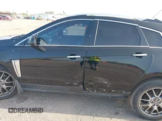 2016 Cadillac SRX Performance Collection with VIN 3GYFNCE33GS522781, listed as a IAAI auction lot 39875542 with 149,864 mi miles and . Bid and sale history available at DreamBid. Image 14.