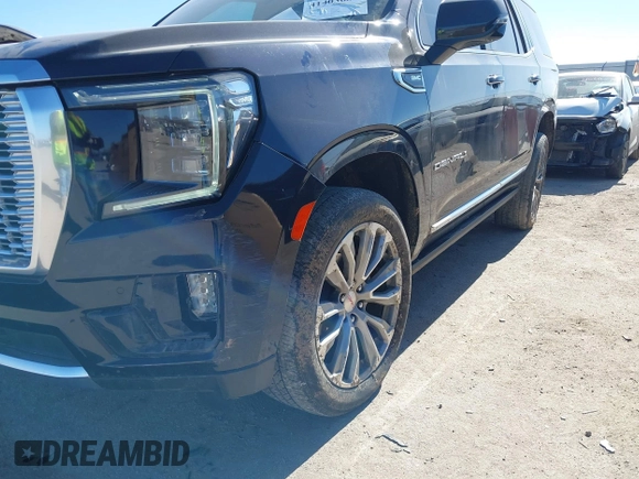 2021 GMC Yukon Denali with VIN 1GKS2DKL1MR135771, listed as a IAAI auction lot 41403680 with 61,772 mi miles. Bid and sale history available at carsss.com. Image 6.