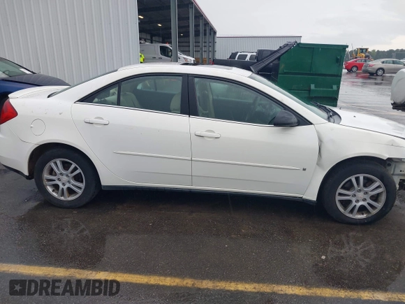 2006 Pontiac G6 6-Cyl z VIN 1G2ZG558364172091, wystawiony jako IAAI lot #42377332 z przebiegiem 199 495 mil mil oraz . Historia ofert i sprzedaży dostępna na DreamBid. Obrazek 13.