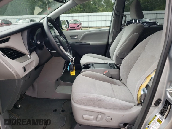 2019 Toyota Sienna LE with VIN 5TDJZ3DC6KS210862, listed as a Copart auction lot 73302064 with 113,768 mi miles and Salvage Title. Bid and sale history available at carsss.com. Image 7.