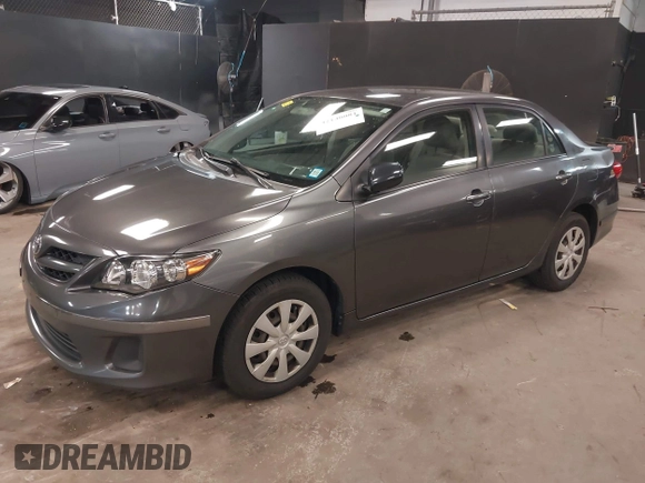 2011 Toyota Corolla L with VIN JTDBU4EE3BJ102060, listed as a IAAI auction lot 42140081 with 125,989 mi miles. Bid and sale history available at carsss.com. Image 2.