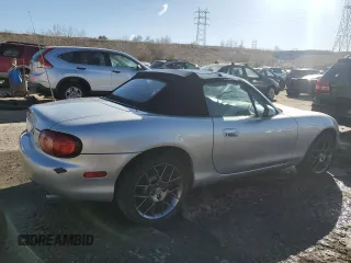 2004 Mazda MX-5 Miata LS with VIN JM1NB353640402308, listed as a Copart auction lot 84568244 with 50,287 mi miles and Salvage title. Bid and sale history available at DreamBid. Image 3.