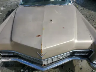 1967 Cadillac DeVille z VIN 87168311, wystawiony jako Copart lot #53429475 z przebiegiem 89 359 mil mil oraz Nie do naprawy • Non repairable. Historia ofert i sprzedaży dostępna na DreamBid. Obrazek 12.